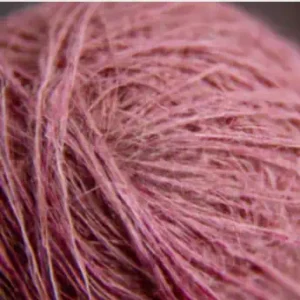 Threads in a ball of pink wool. An example of woollen threads and of many strands put together results in something altogether more useful! Like social media entrepreneurship.